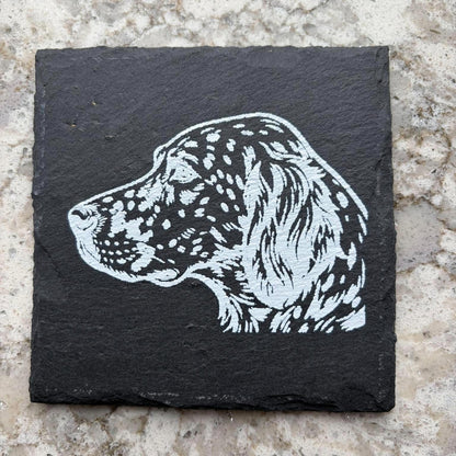 Handmade slate coaster with a white setter head in profile against dark slate
